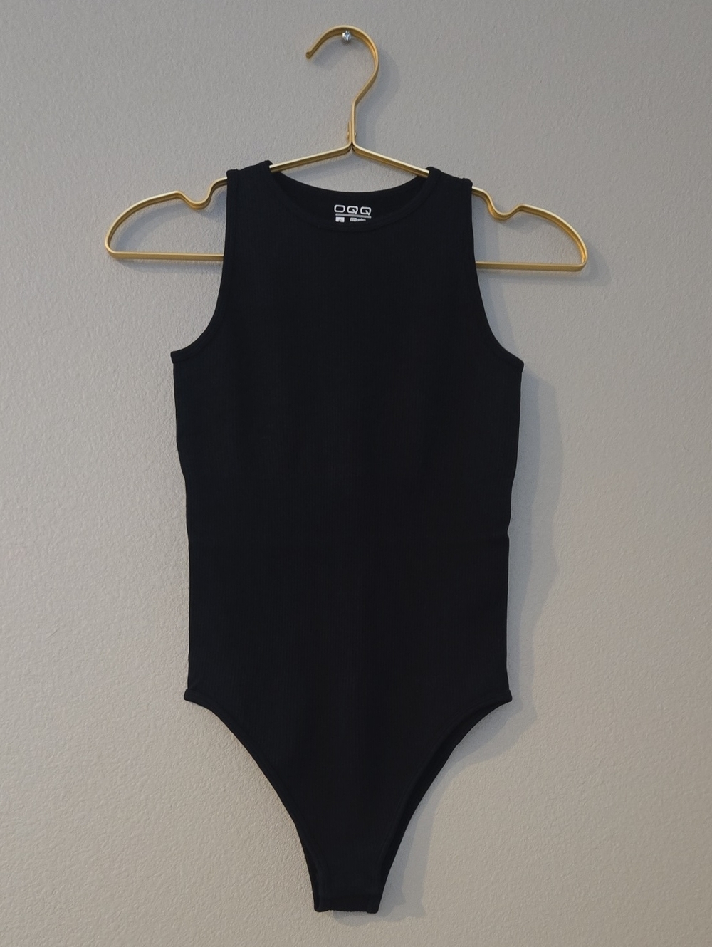 OQQ Womens Black Sleeveless One-Piece Bodysuit
